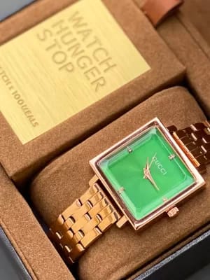 Gucci gold wrist watch for women